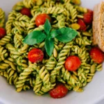Pasta with pesto pumpkin seeds and pumpkin bread