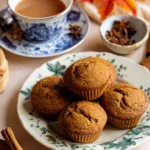 Serving pumpkin chai muffins with chai tea