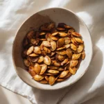 Recipe card for Spicy Sriracha Pumpkin Seeds