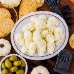 Halloween serving platter with mozzarella skulls
